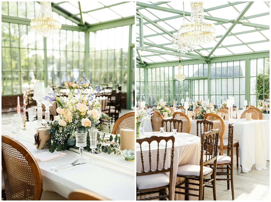 wedding reception space in a glass greenhouse with assorted wooden chairs, white tablecloths, and glass chandeliers