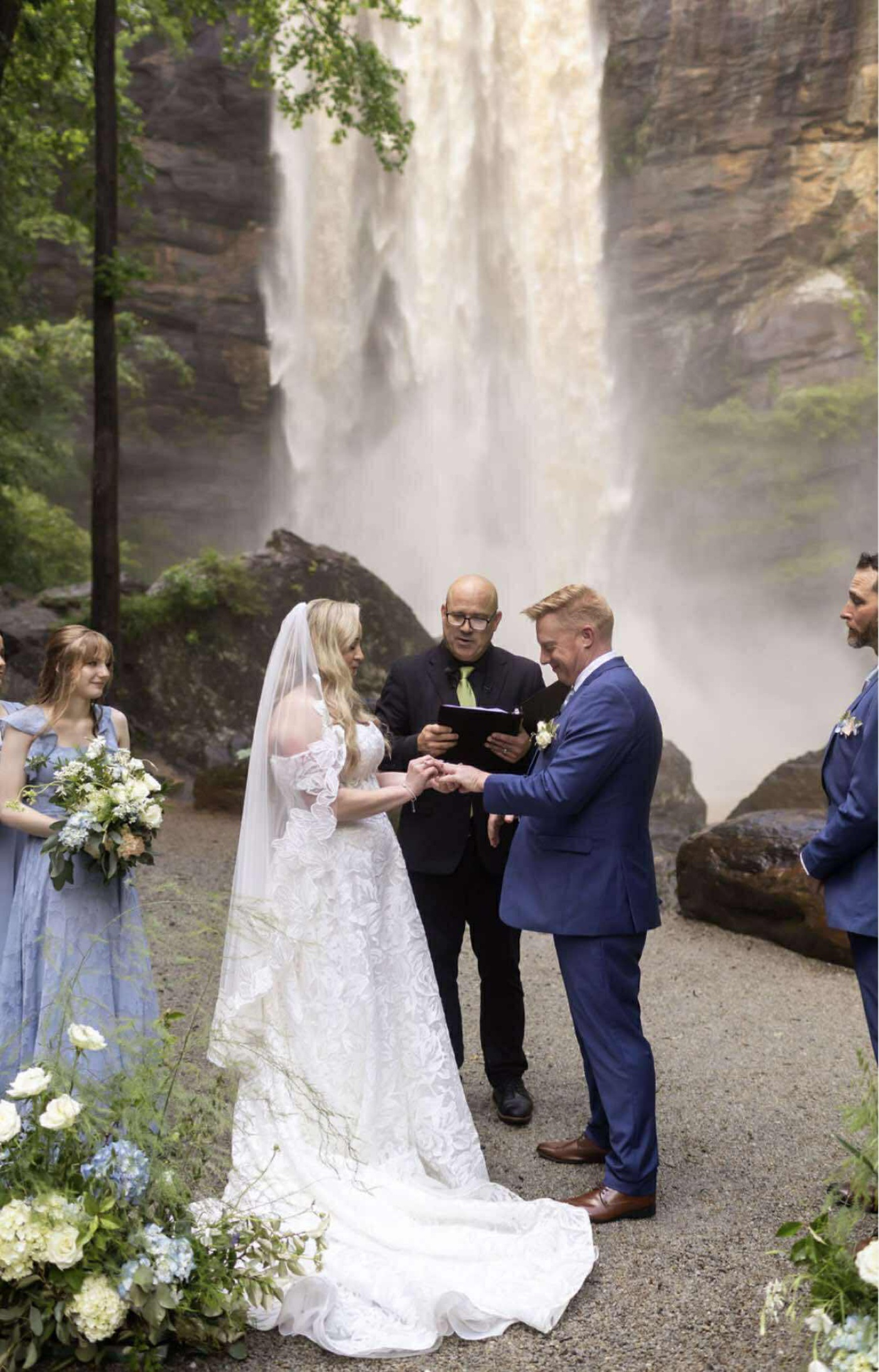 Wedding ceremony underneath the waterfall at Toccoa Falls College