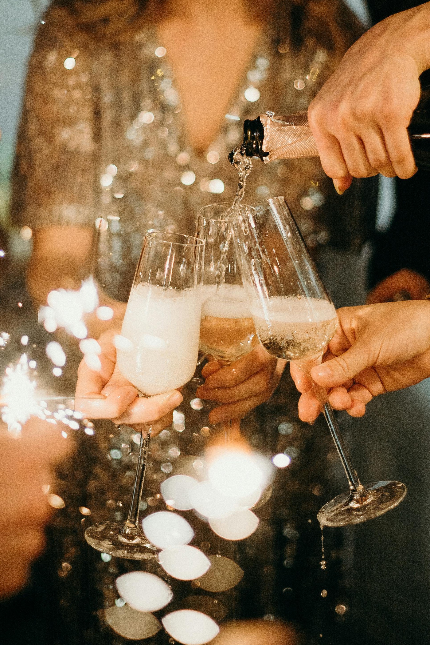 Guests toasting with champagne at a wedding reception